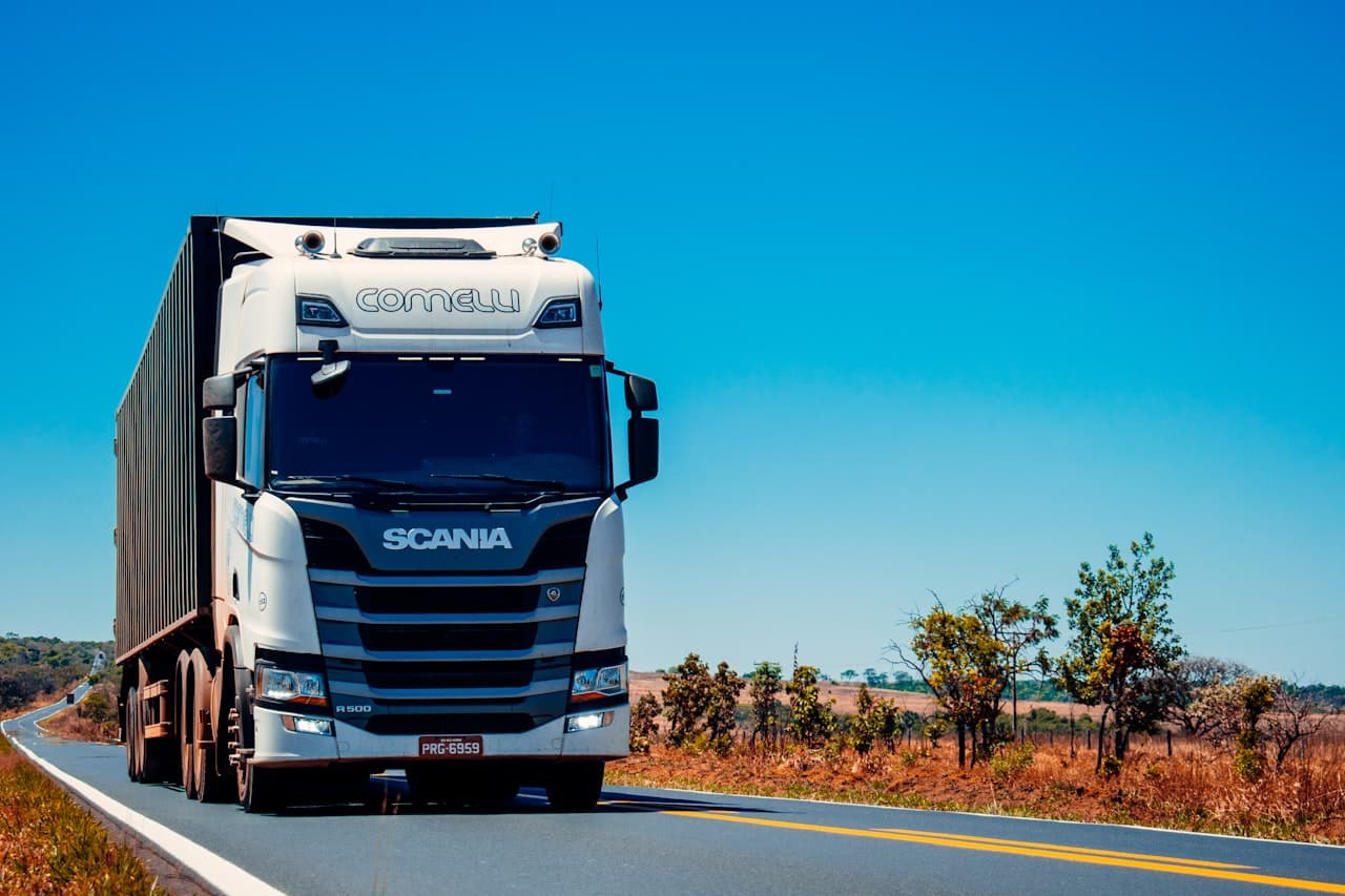 Commercial semi-truck hauling freight on an open highway
